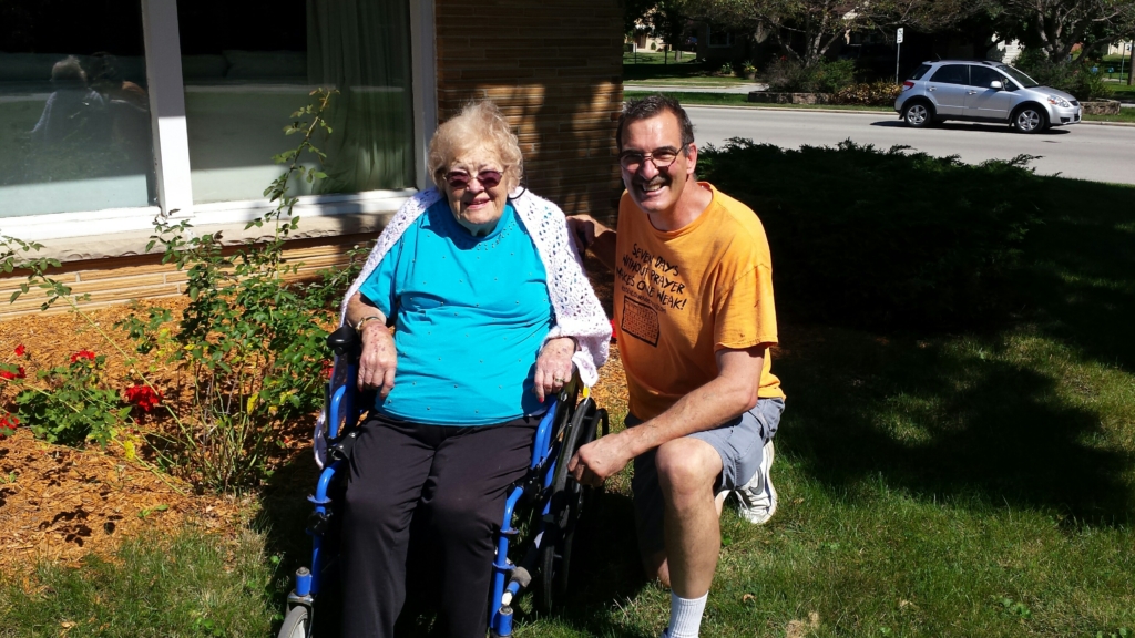 Mom and I in the front yard after a walk. NeedEncouragement.com